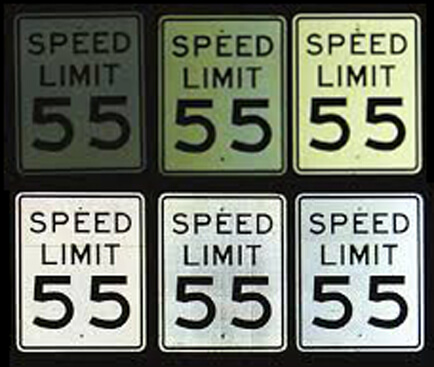 speed limit signs showing various retroreflectivity from dim to bright