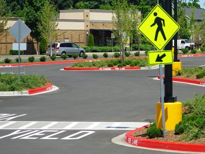 pedestrian crossing sign and road markings