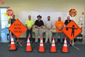 photo of representatives from municipalities that won this year’s free work zone equipment contest