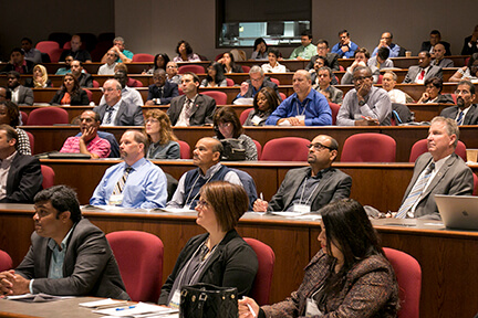 photo of audience at a large conference