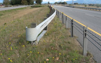 cable barriers to help reduce drivers from crossing through the median into oncoming traffic. Photo: WSDOT.