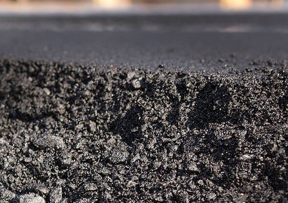 extreme close up of asphalt pavement
