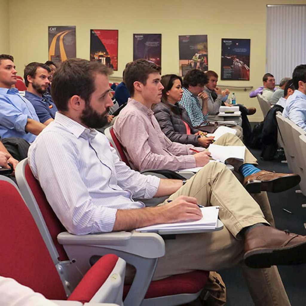 large audience attending a workshop in the CAIT auditorium