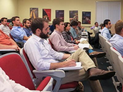 large audience attending a workshop in the CAIT auditorium