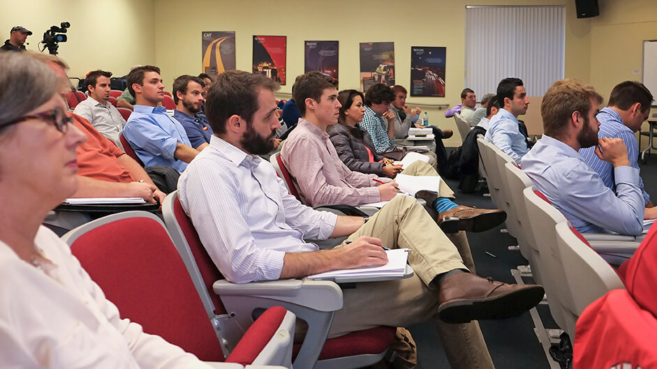 large audience attending a workshop in the CAIT auditorium