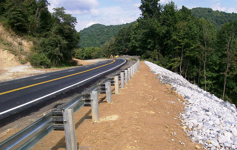 guardrail along a curvy mountain road