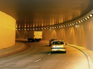 Row of vehicles moving through the tunnel