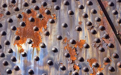 rusted steel plate and rivets