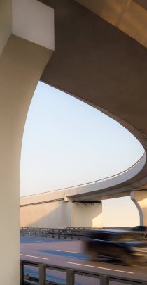 View from below to a concrete overpass.